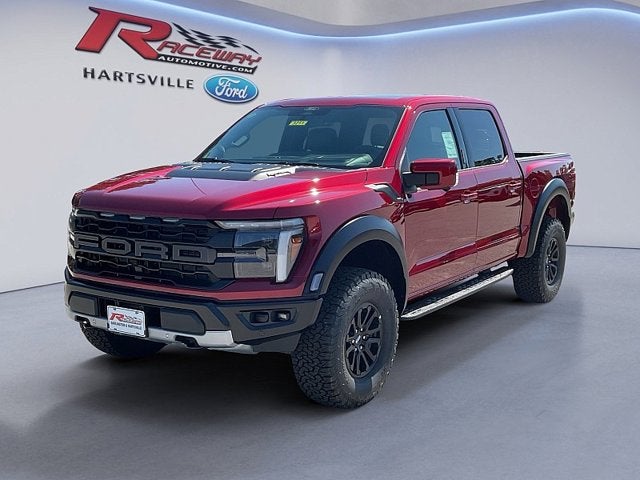 2026 Ford F-150 Raptor in Ruby Red — front three-quarter view